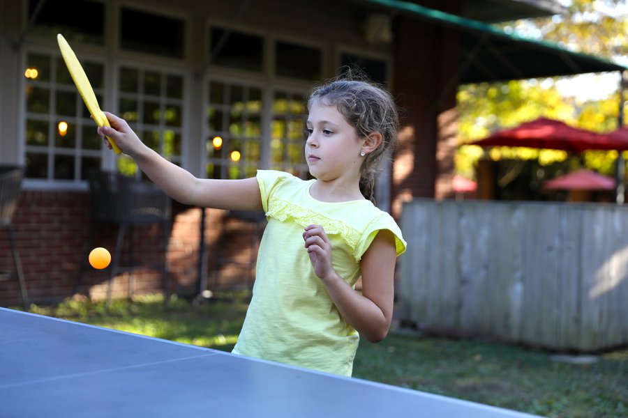 Girl Playing Table Tennis at the Woodlands Hotel