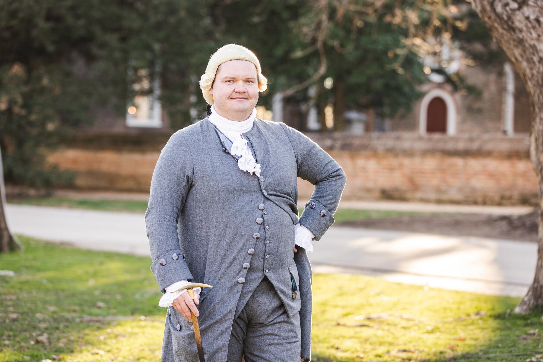 An interpreter dressed as George Wythe faces the camera.