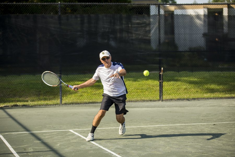 W&M Cap Man Playing Tennis