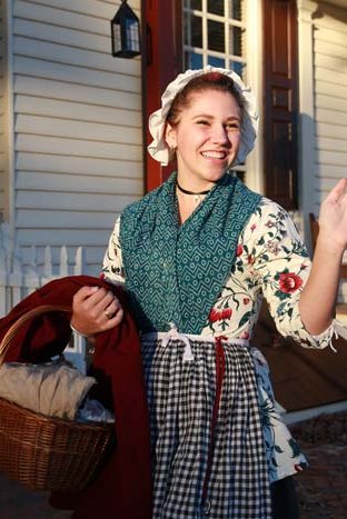 woman-waving-raleigh-porch-2018